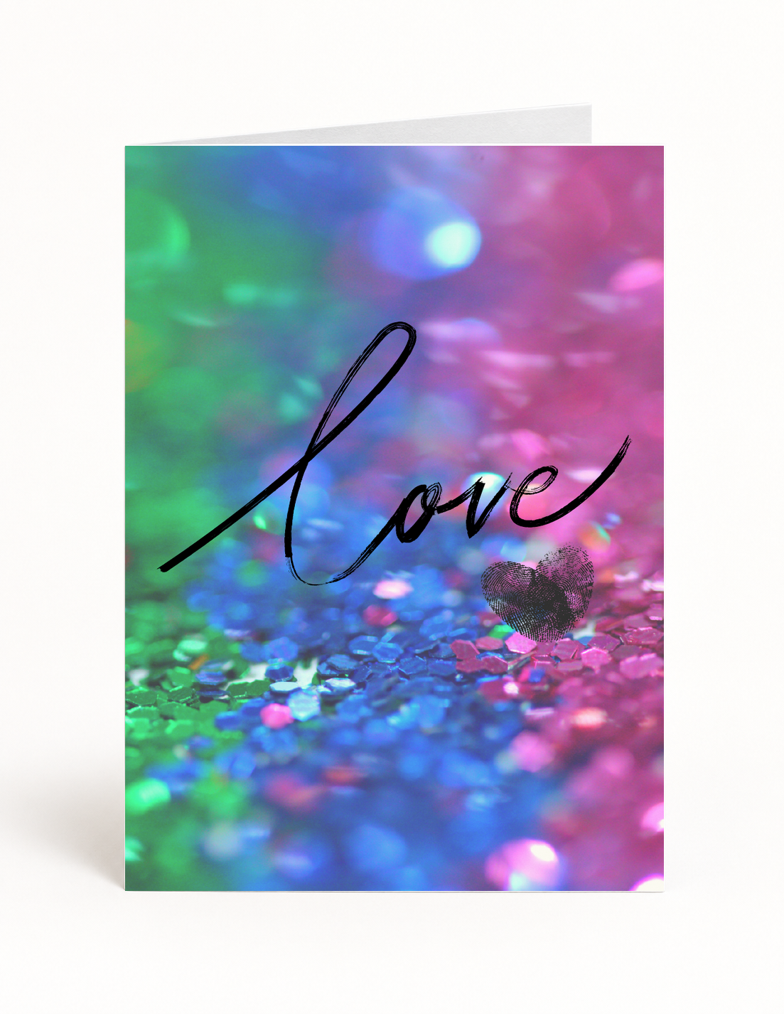 Whole Package love card front with colorful rainbow sparkle design